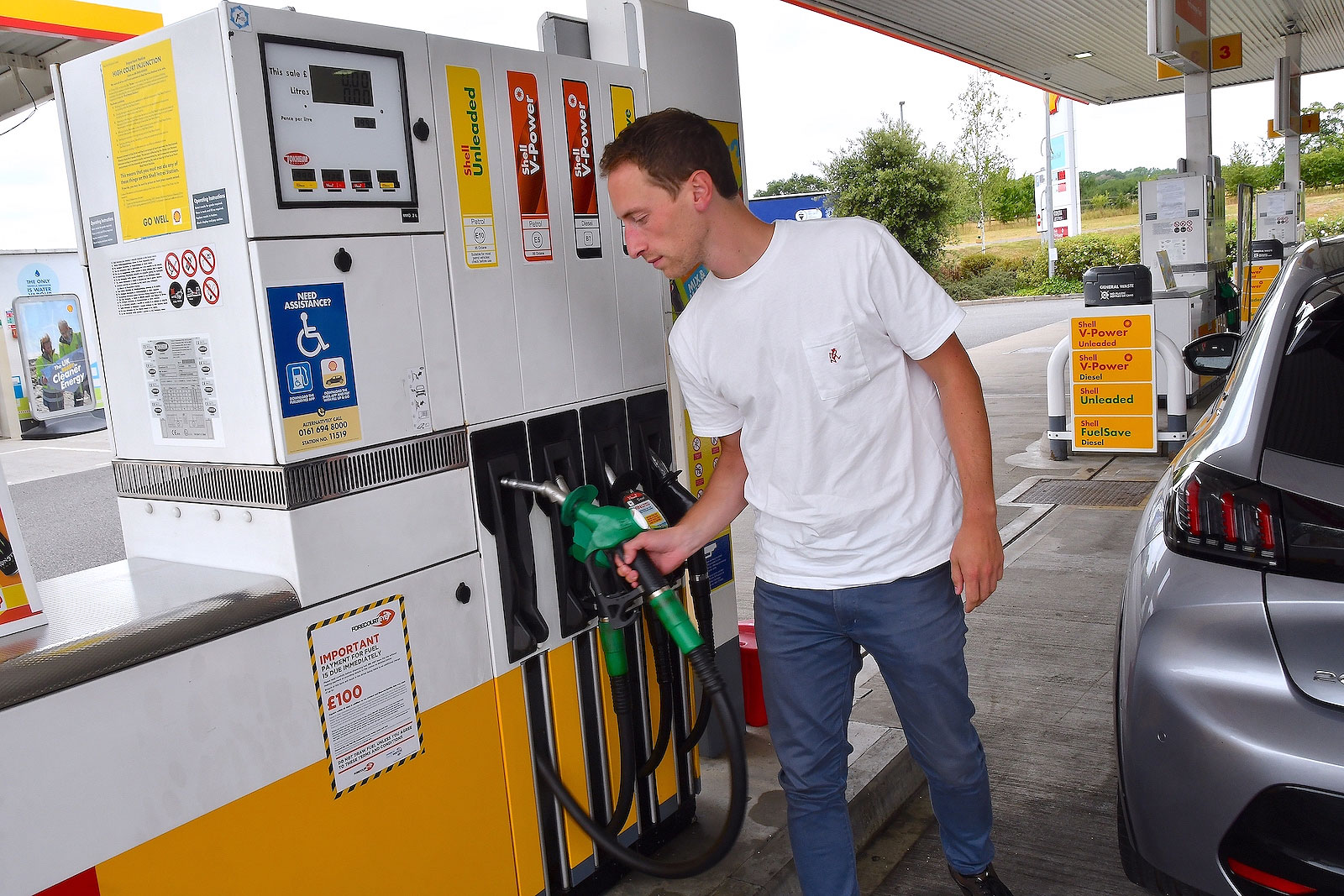 Doug Revolta at a petrol pump