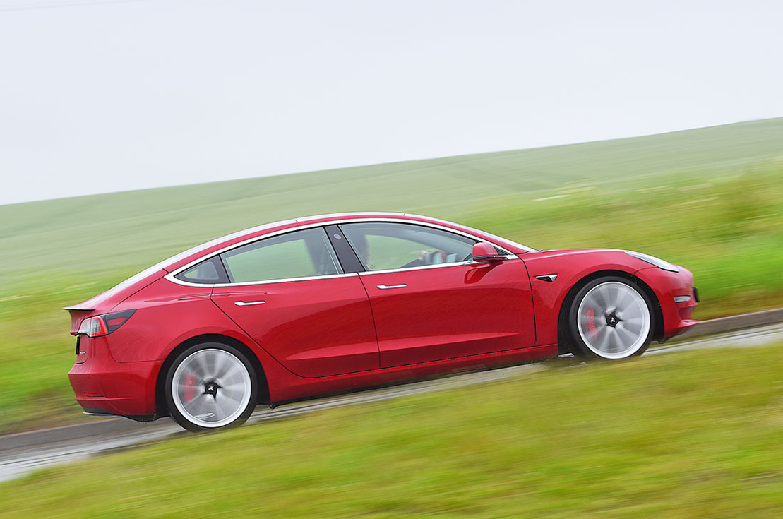 Tesla Model 3 driving