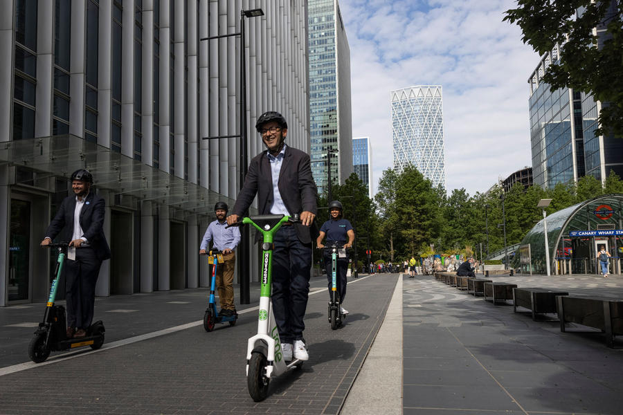 commuters with e-scooters