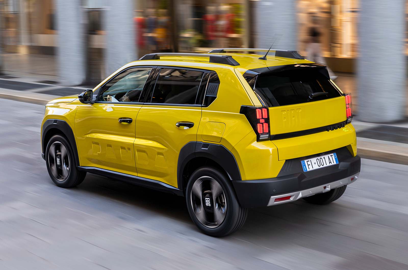 2025 Fiat Grande Panda rear driving yellow