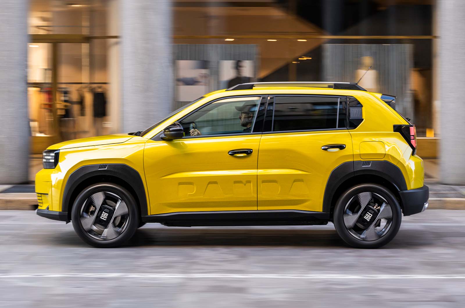 2025 Fiat Grande Panda side driving yellow