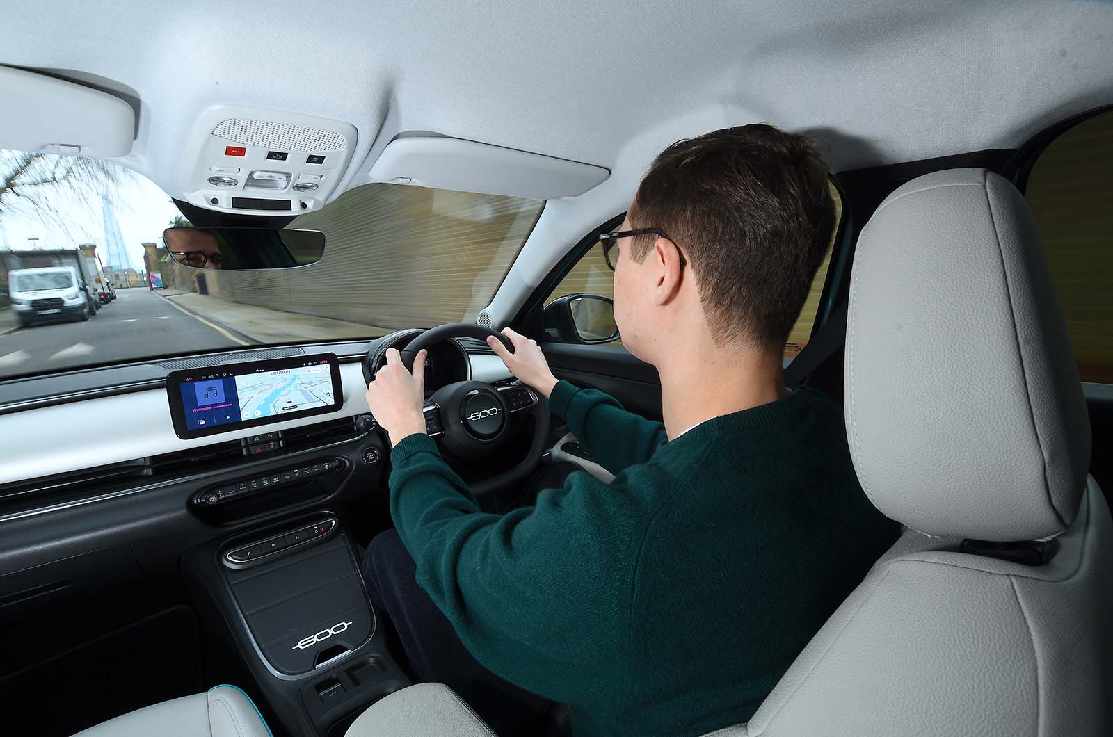 George Hill test-driving Fiat 600