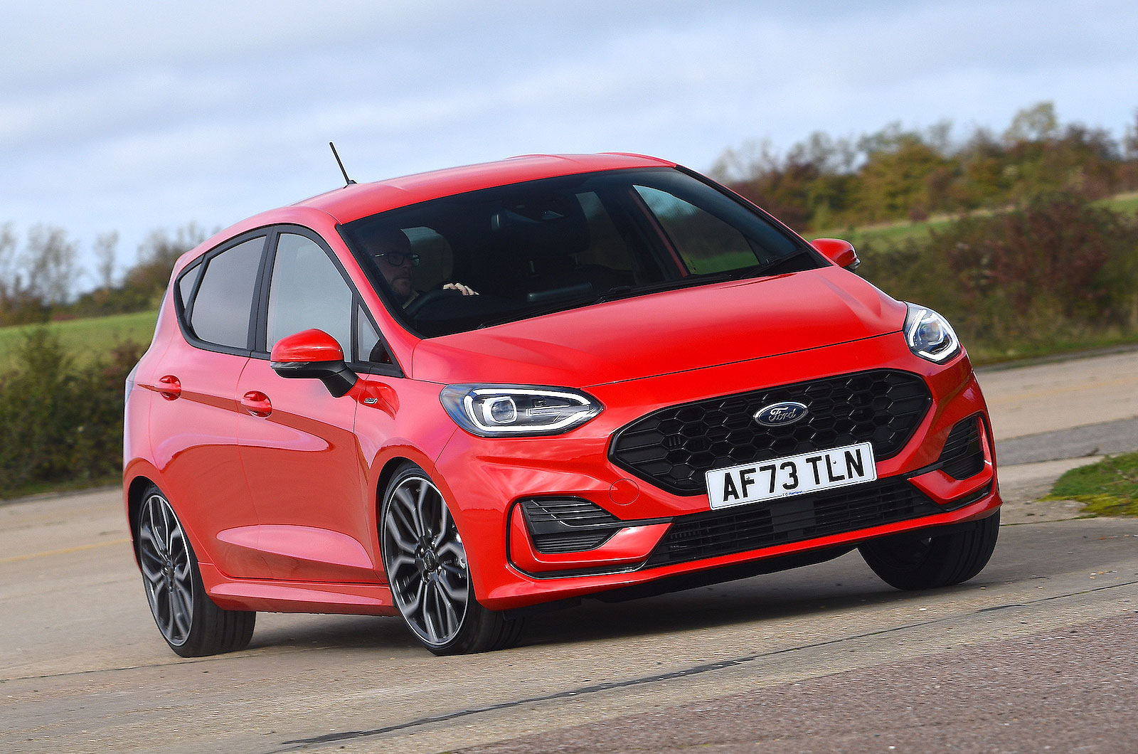 Red Ford Fiesta front cornering