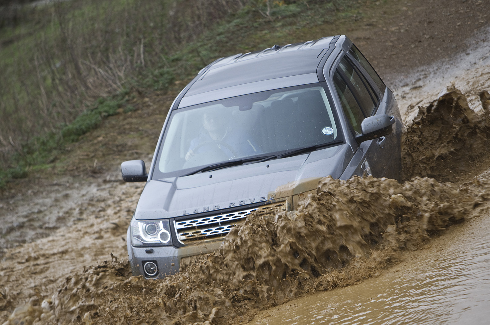 Land Rover Freelander driving through water
