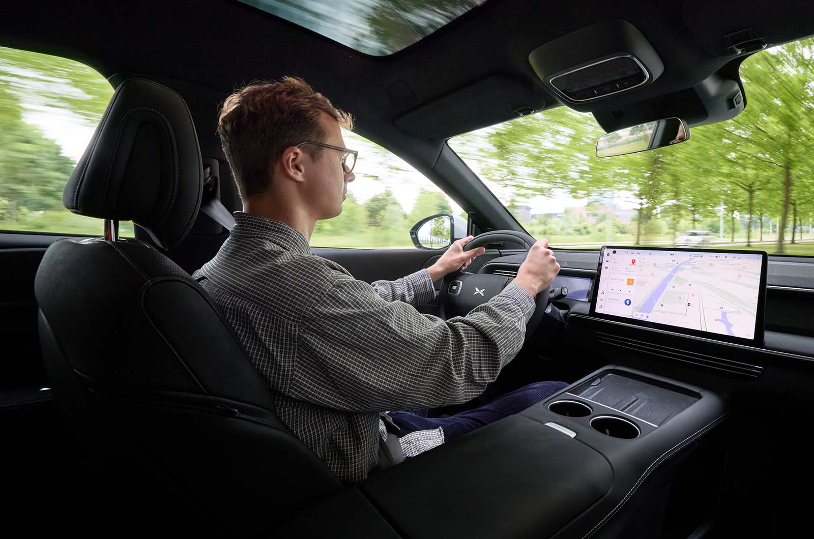 George Hill test driving XPeng G6