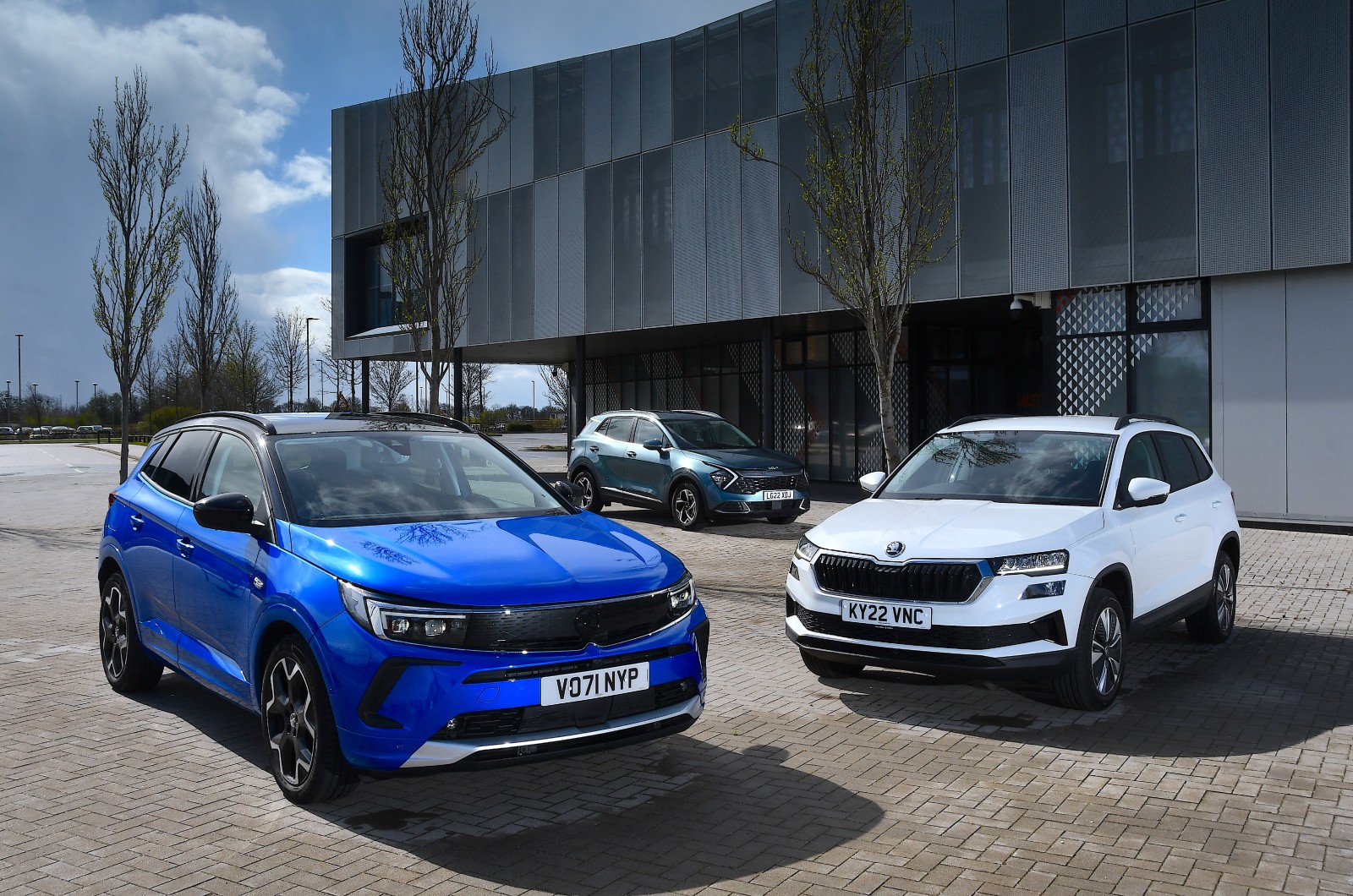 New Skoda Karoq vs New Vauxhall Grandland vs Kia Sportage header