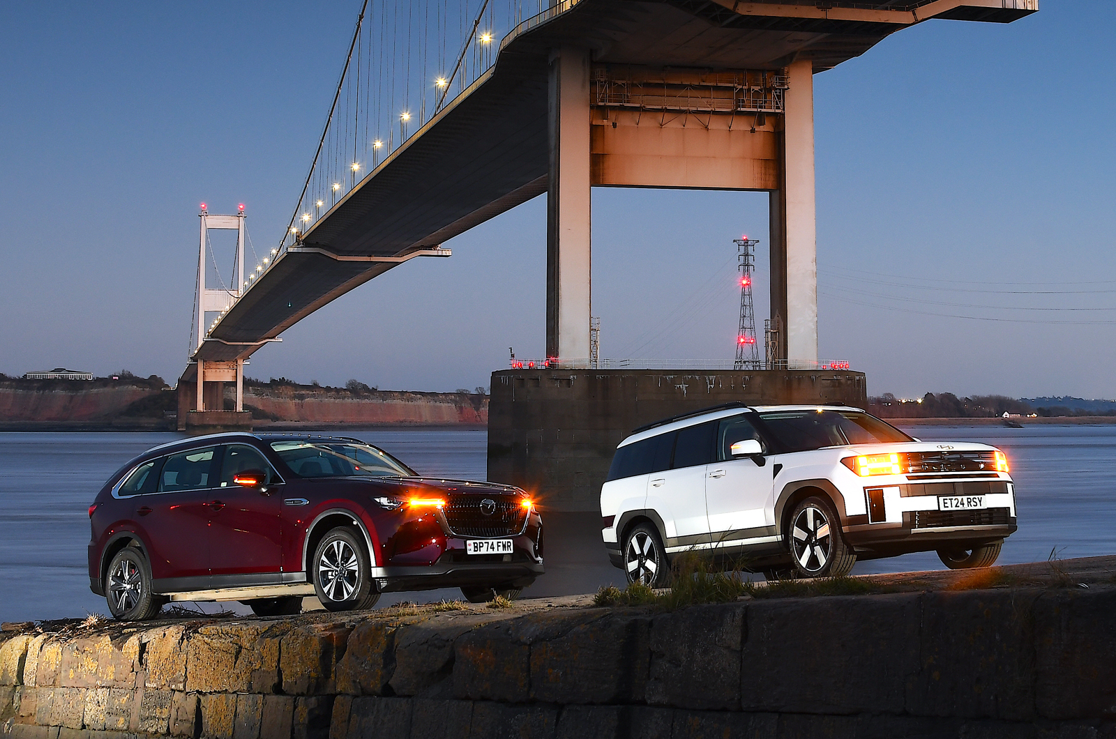 Hyundai Santa Fe and Mazda CX-80 under Severn Bridge