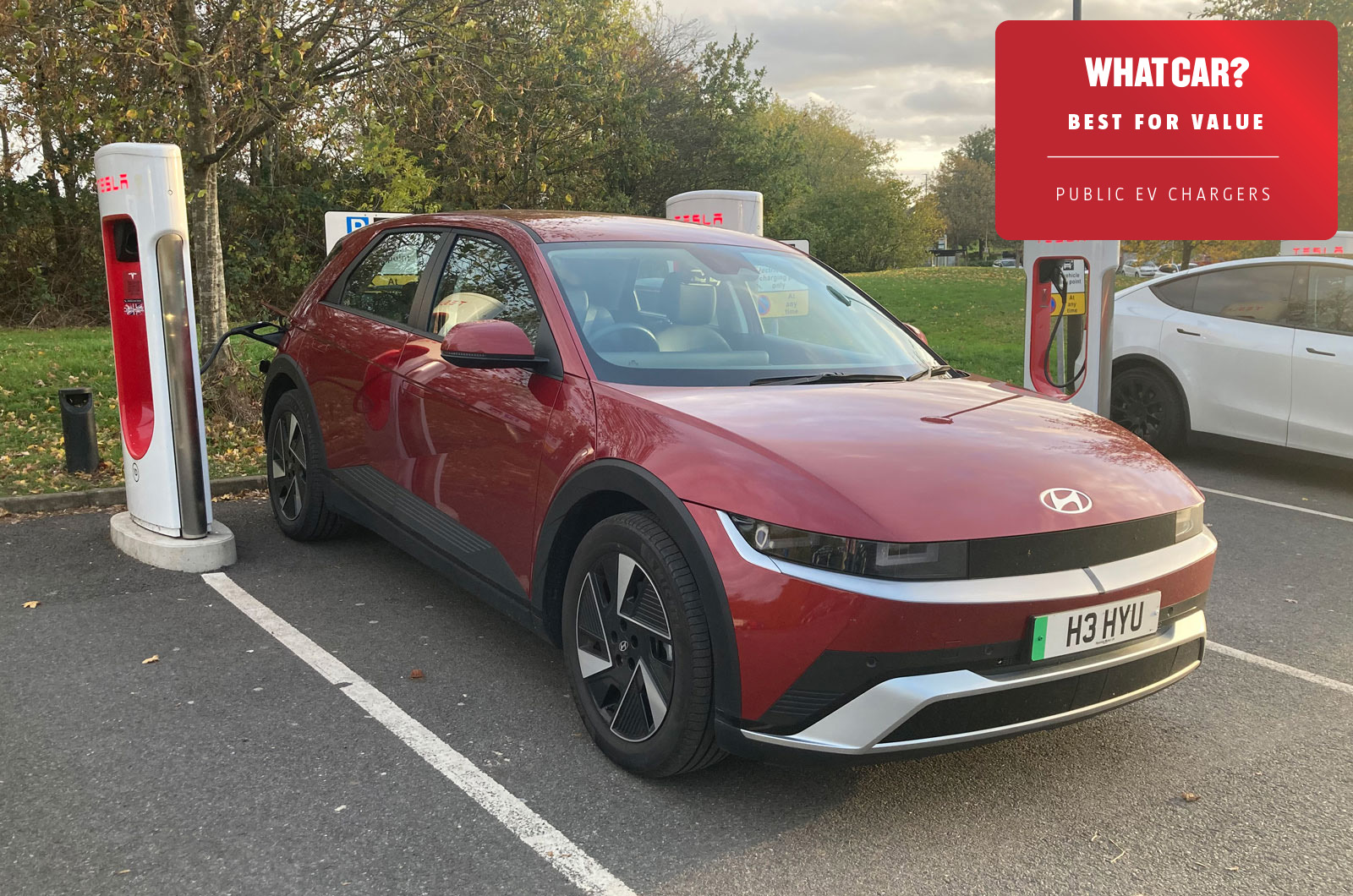 Ioniq-5-at-Tesla-public-EV-charger with logo