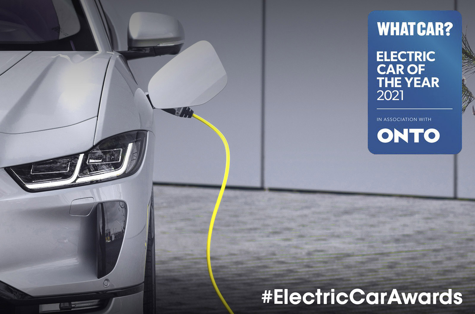 Jaguar I-Pace charging with Electric Car Awards 2021 logo
