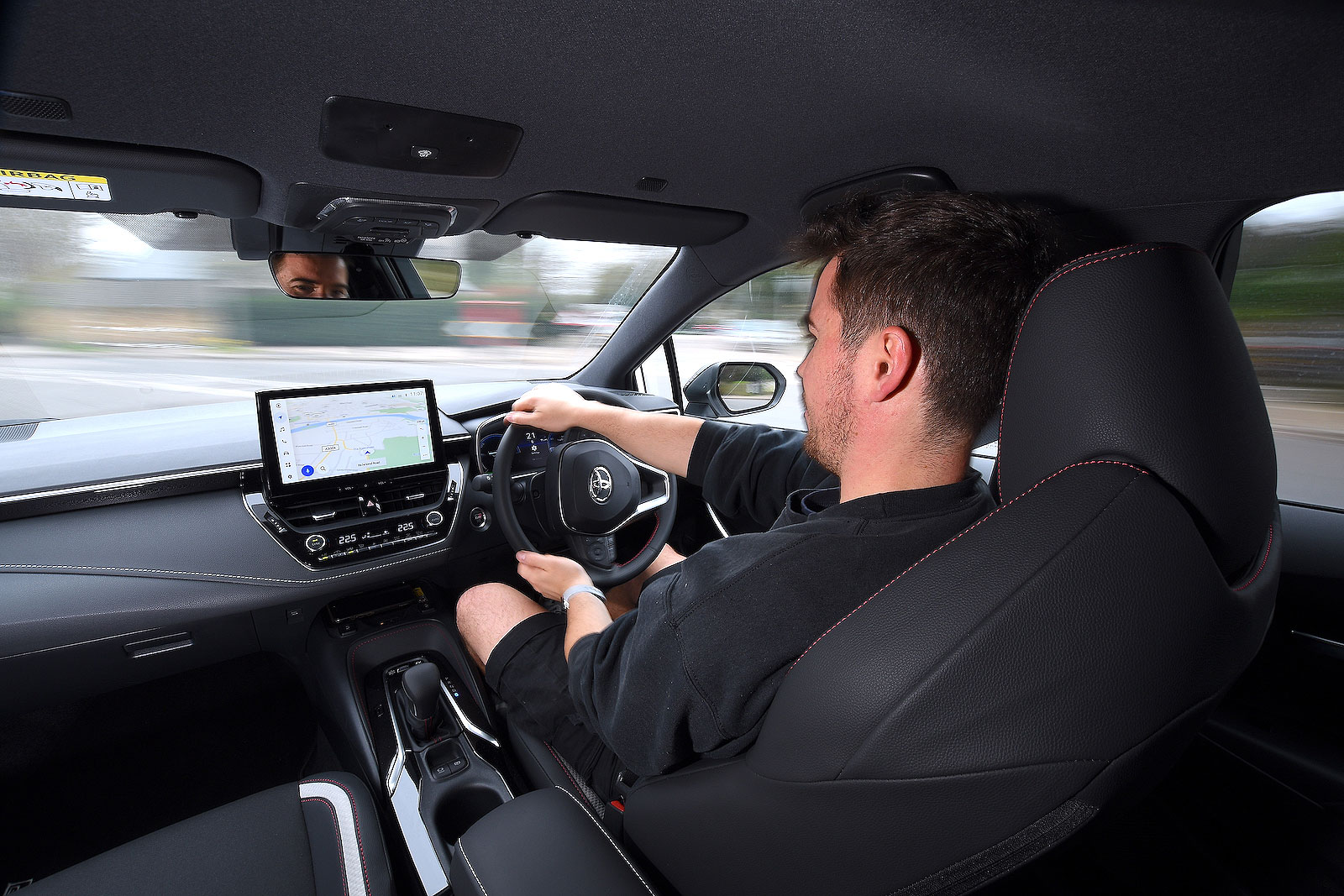 Jonty Renk test driving Toyota Corolla Touring Sports