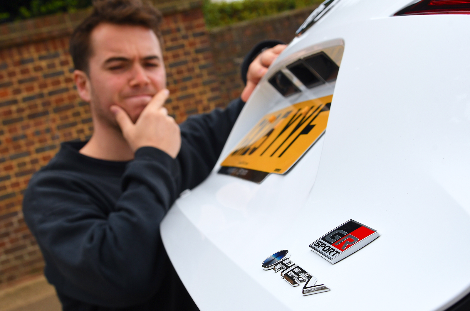 Jonty looking curiously at GR Sport badge
