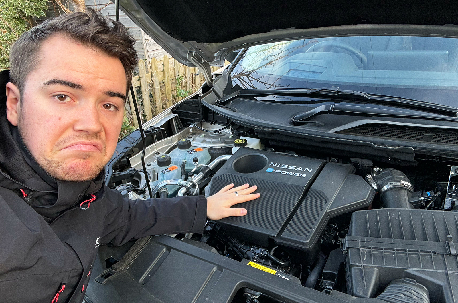 Jonty looking under bonnet, impressed with ePower system