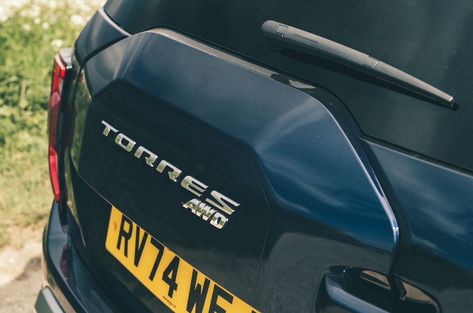 KGM Torres rear badge