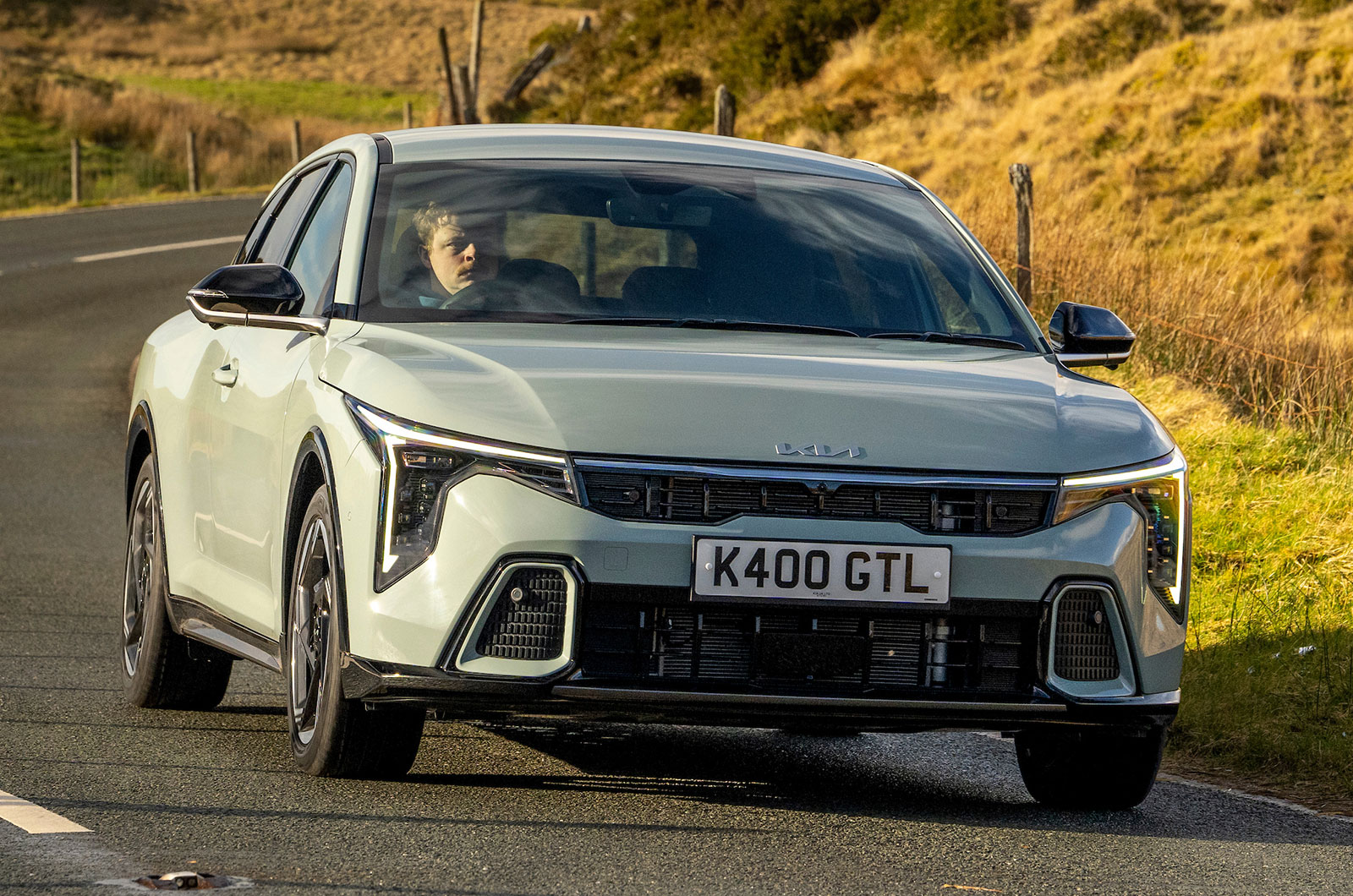 Kia K4 front driving right