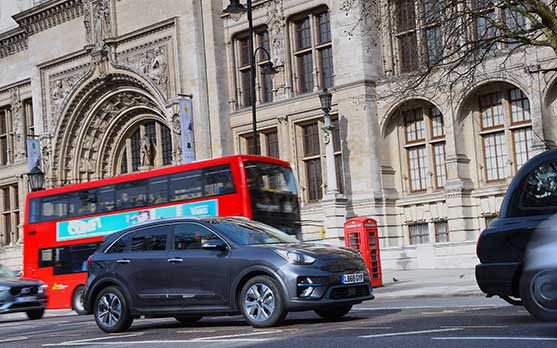 Kia e-Niro in central London with red bus