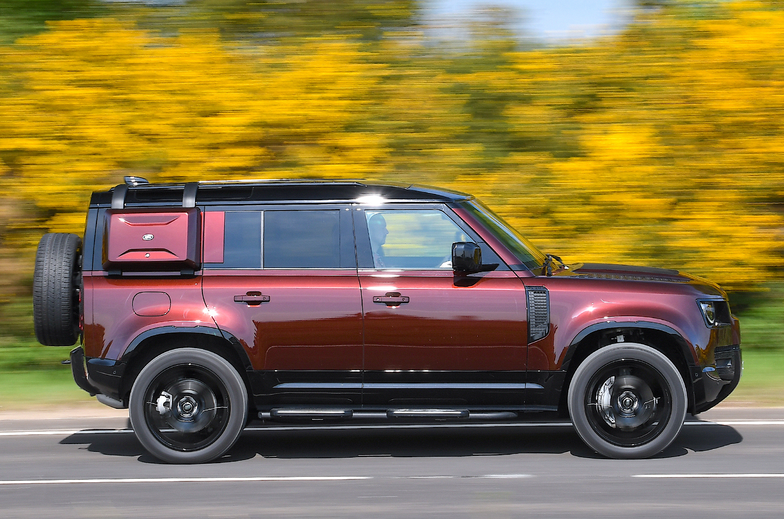 Land Rover Defender Sedona Edition side driving