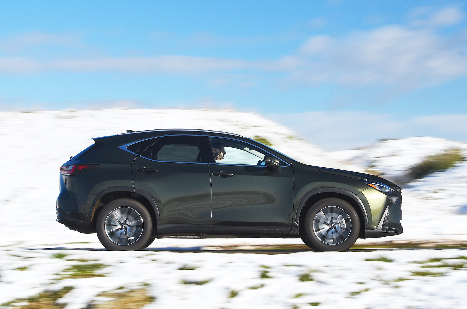 Lexus NX side driving
