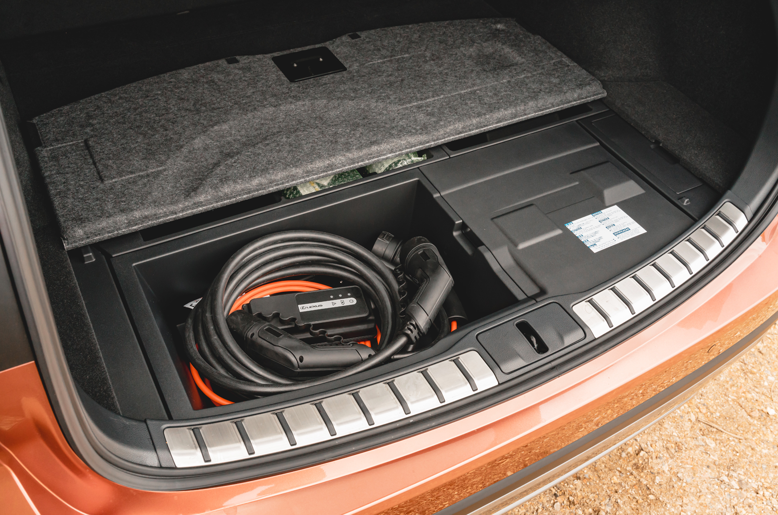 Lexus RX charging cables under boot floor