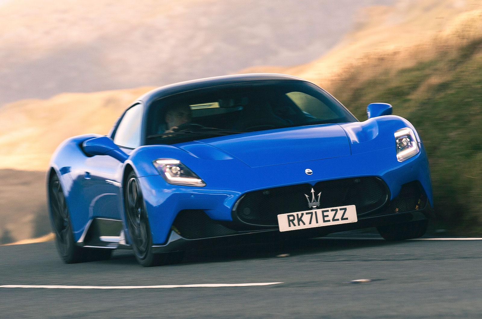 Blue Maserati MC20 front cornering