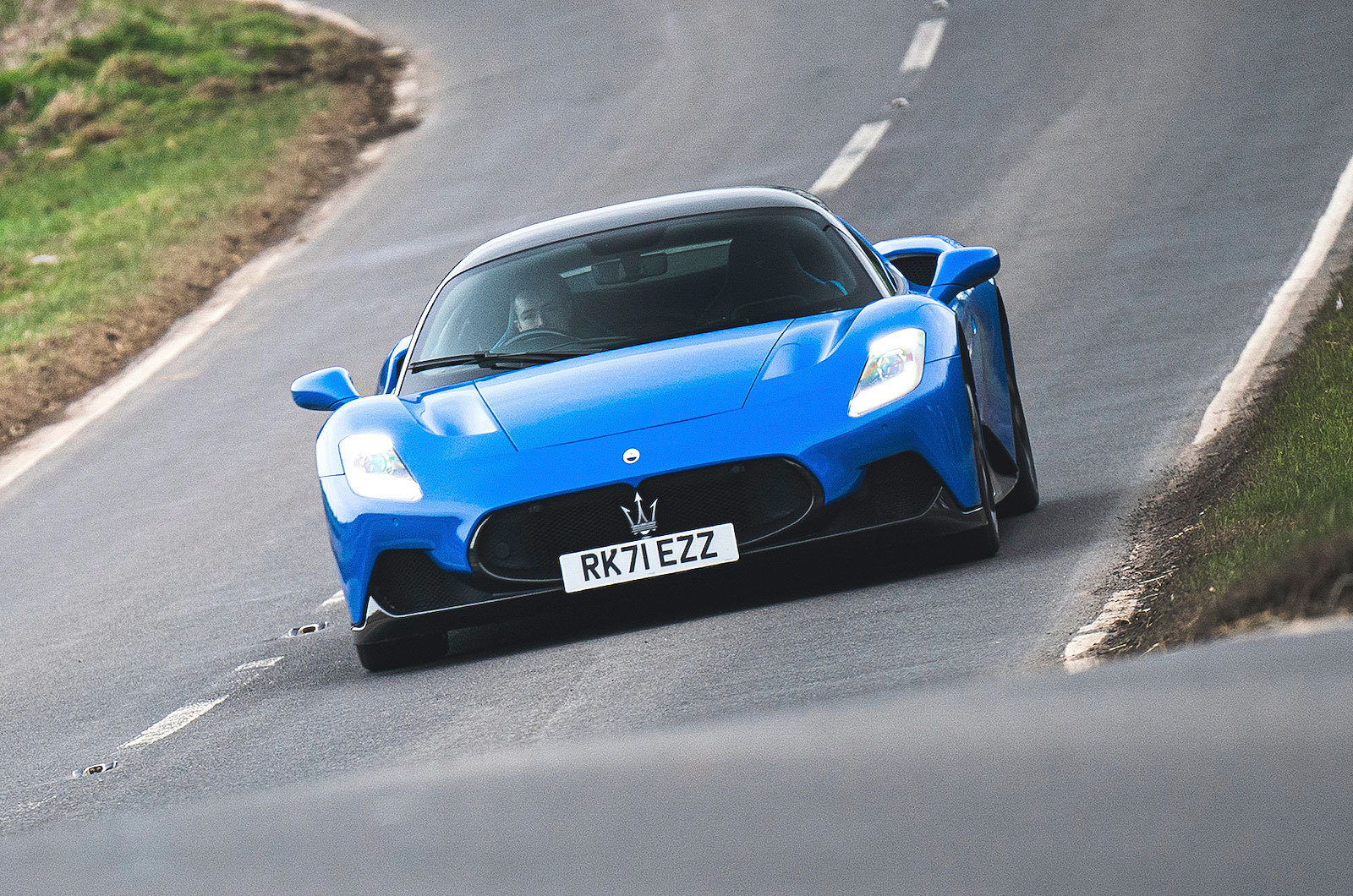 Blue Maserati MC20 front driving