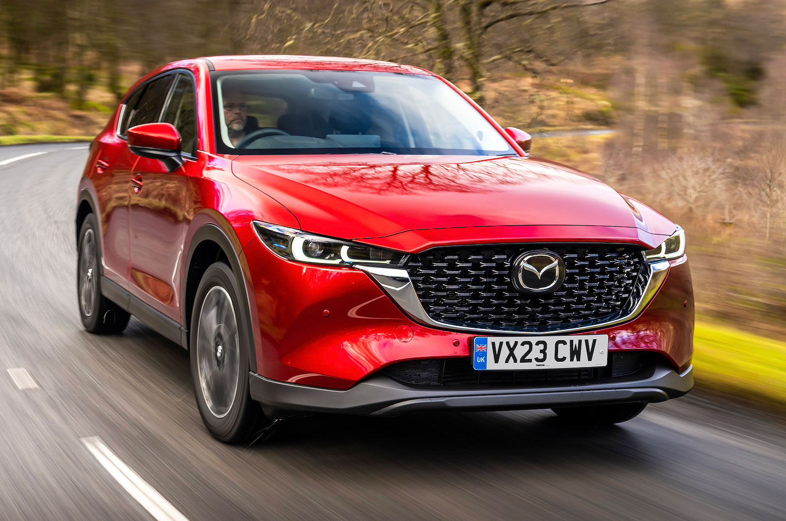 Red Mazda CX-5 front right driving