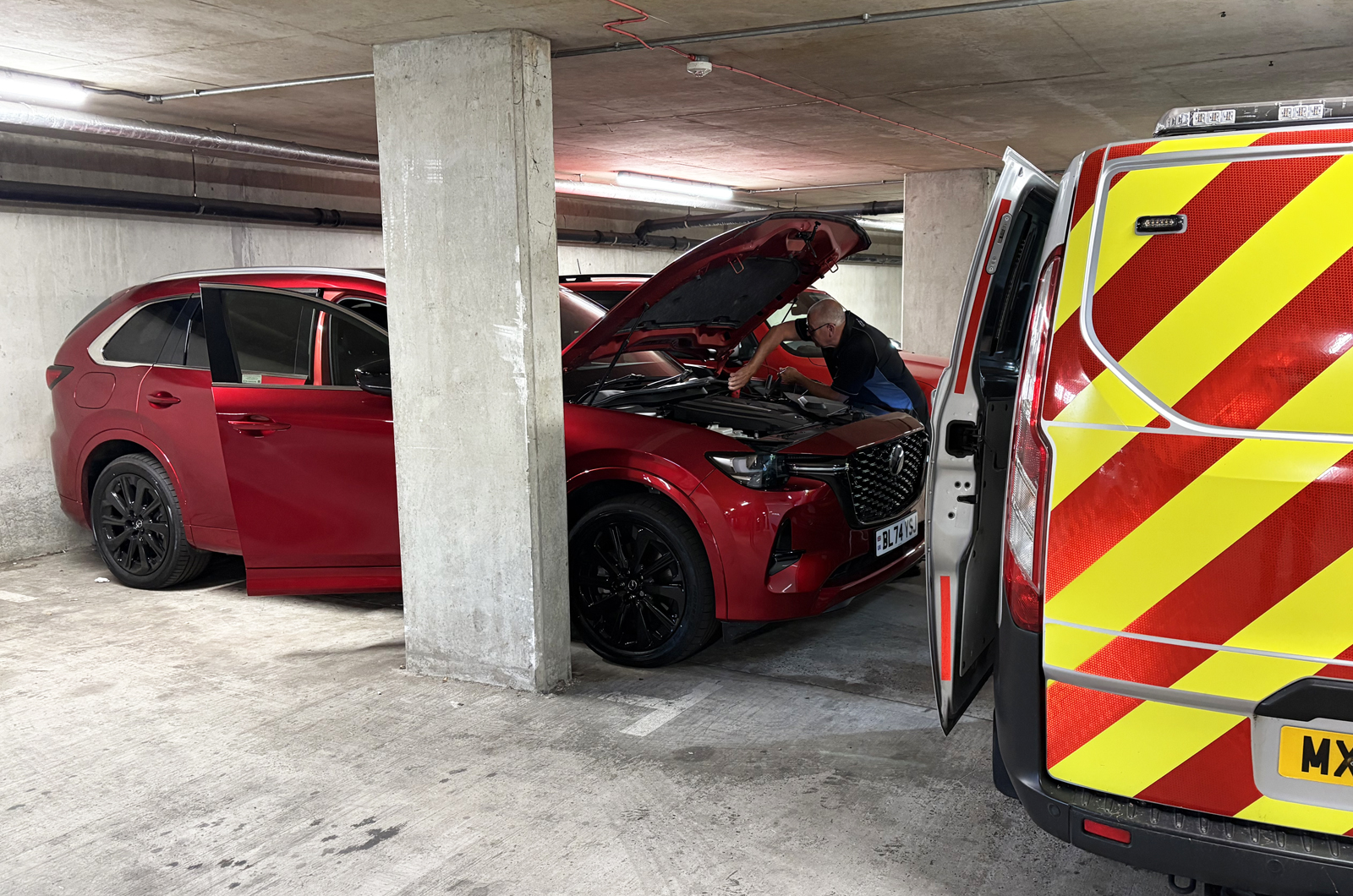 Mazda CX-80 LT being jump started