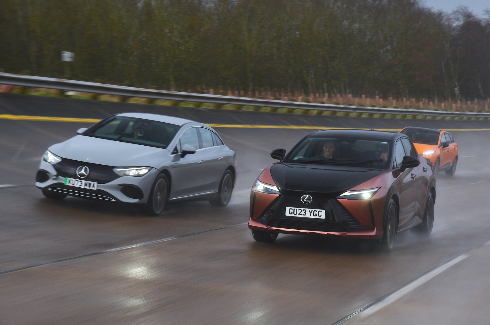 Mercedes EQE passing Lexus RZ