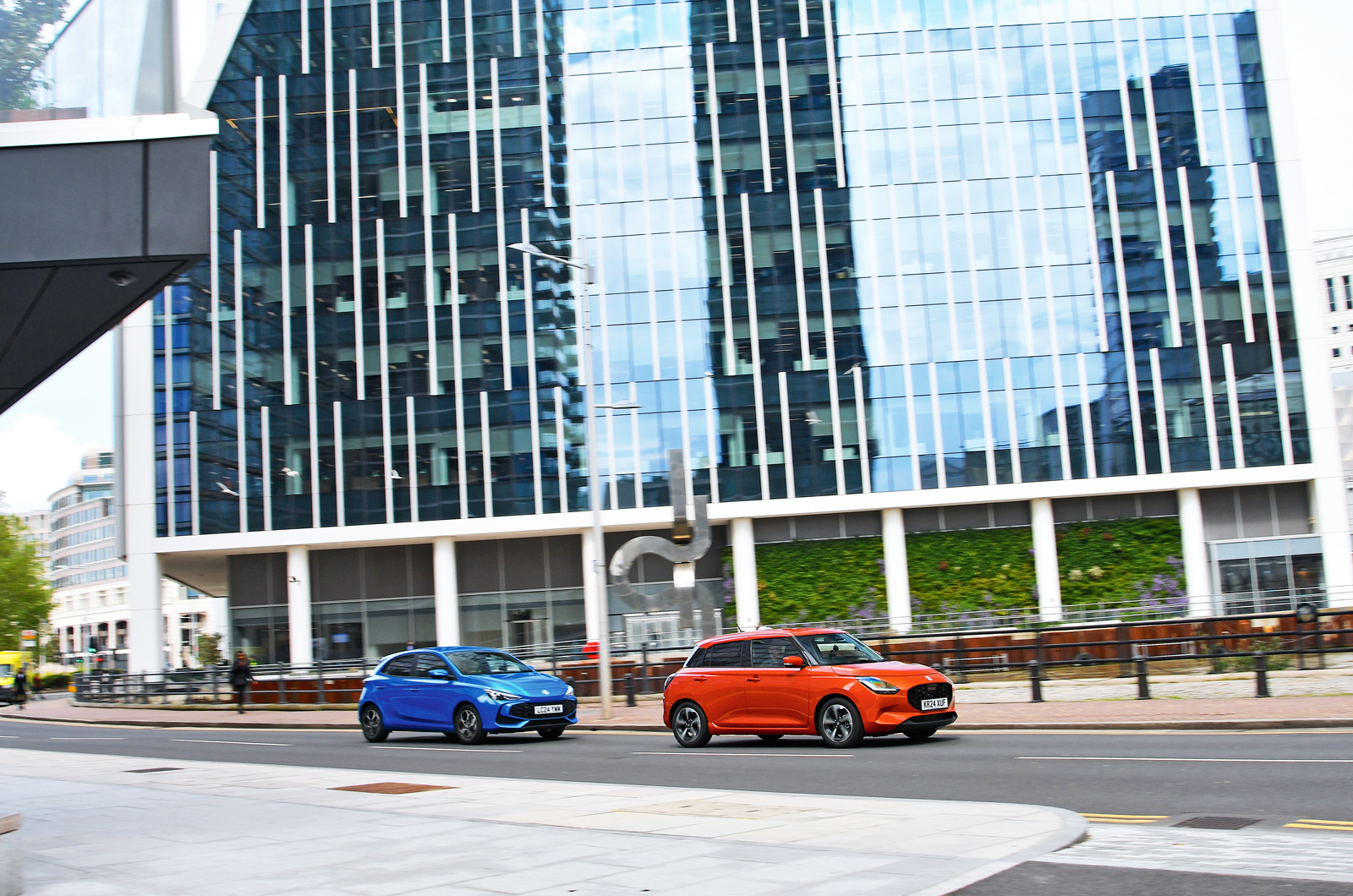 MG 3 and Suzuki Swift driving through London