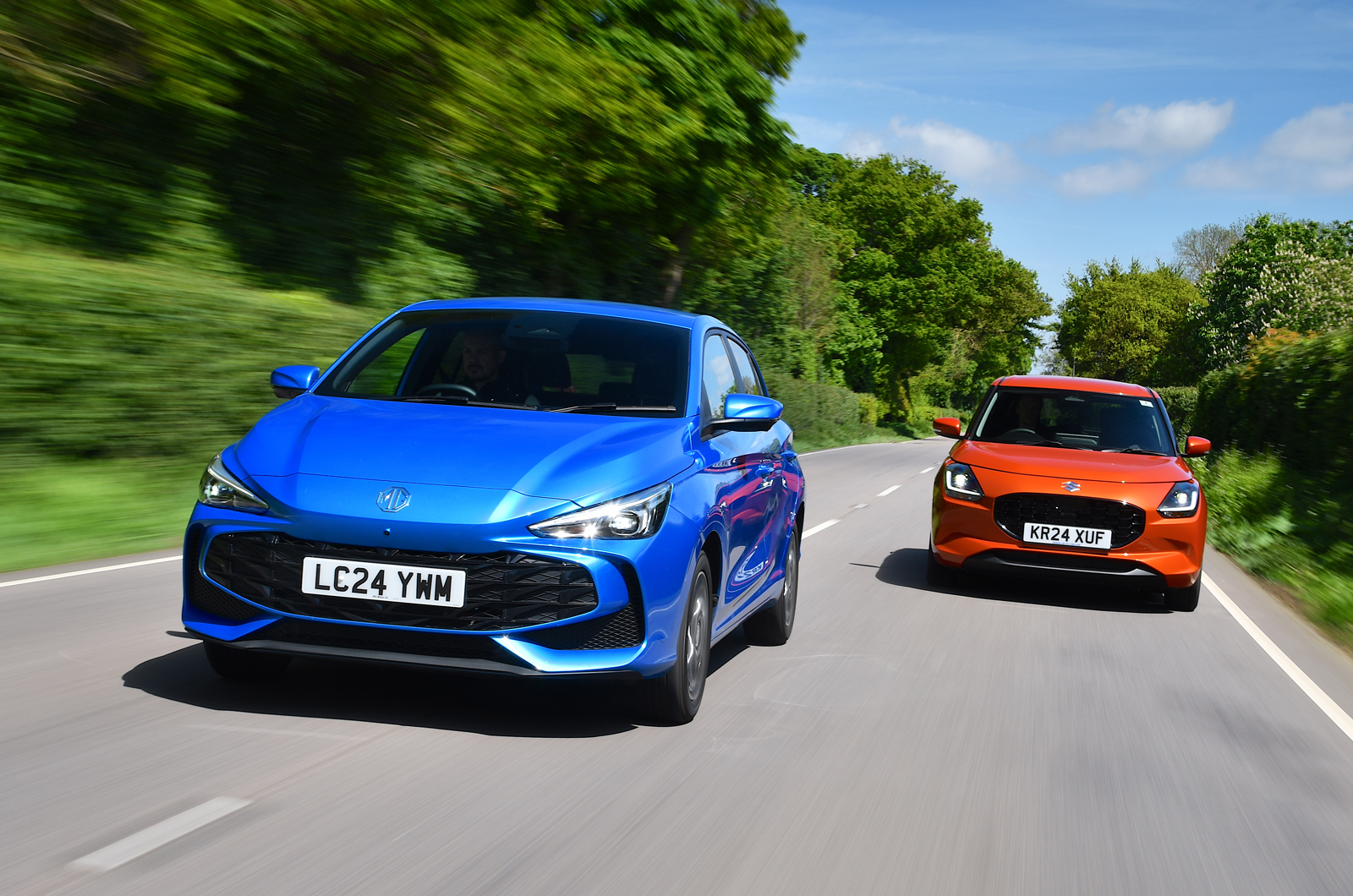 MG 3 and Suzuki Swift fronts driving