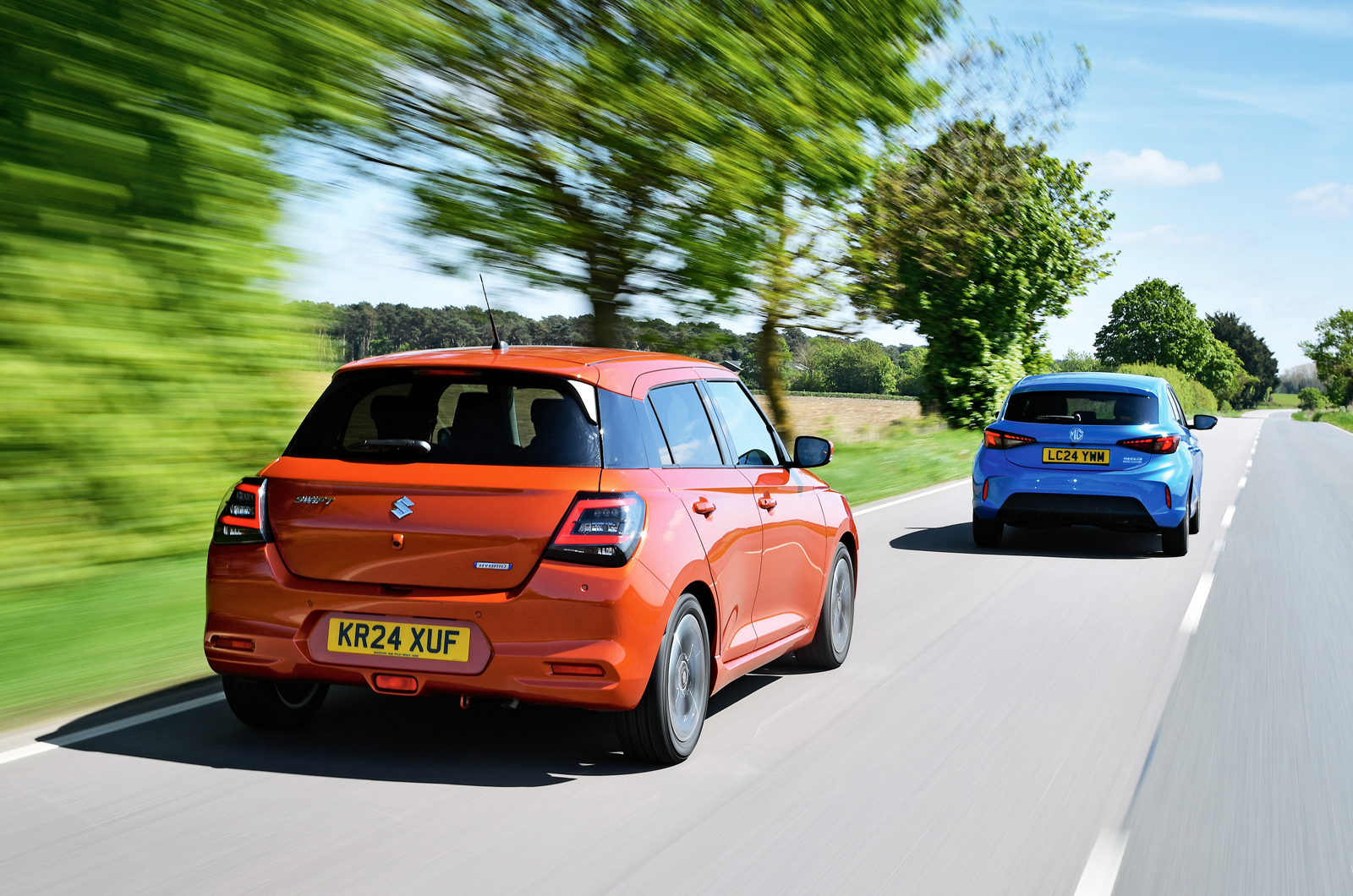 MG 3 and Suzuki Swift rears driving
