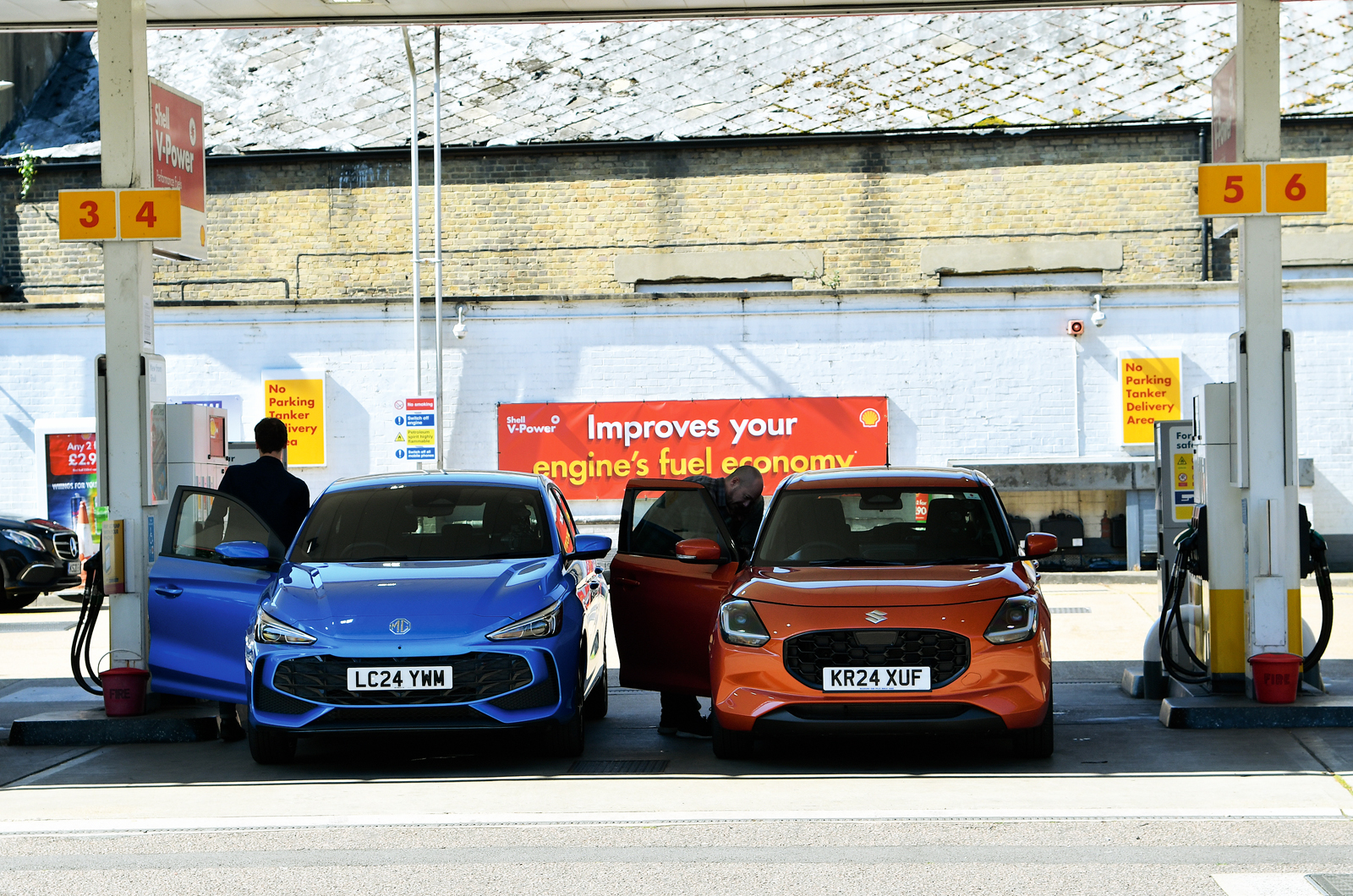 MG 3 and Suzuki Swift refueling