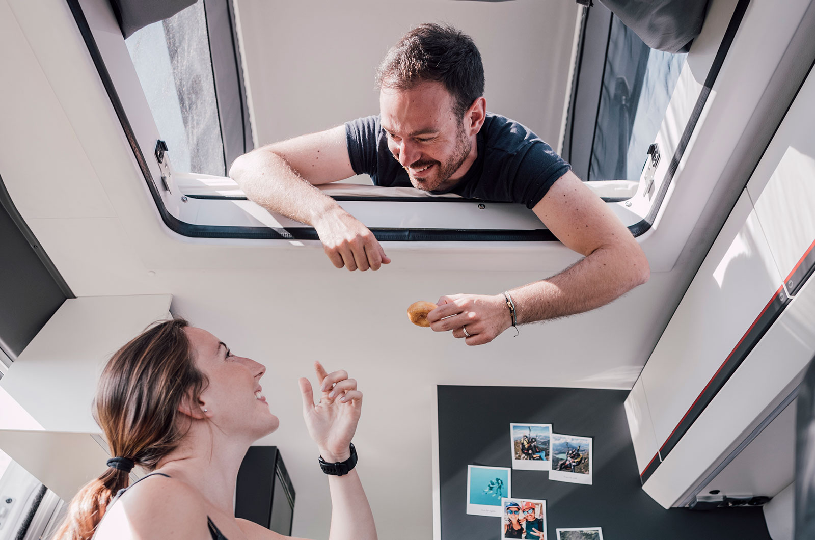 Couple packing up motorhome