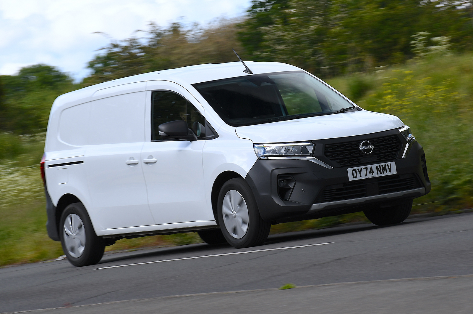 Nissan Townstar driving front right