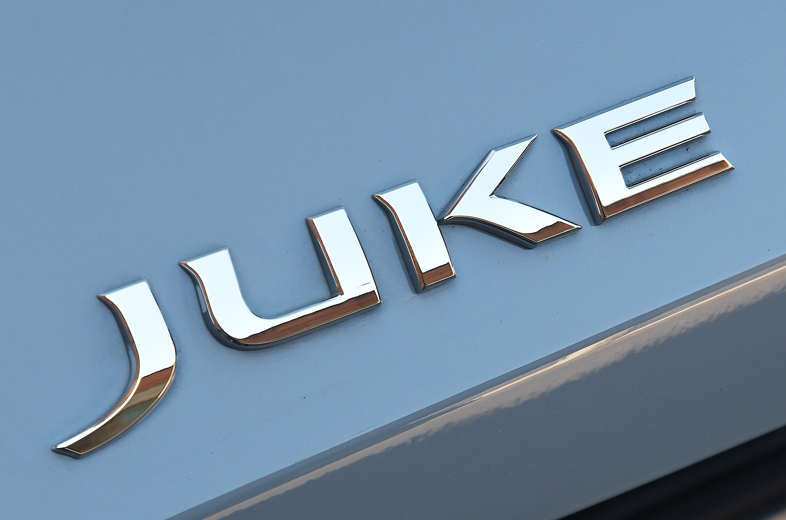 Nissan Juke Hybrid boot badge