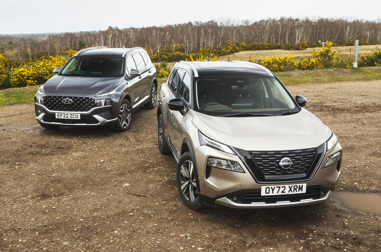 Nissan X-Trail vs Hyundai Santa Fe fronts