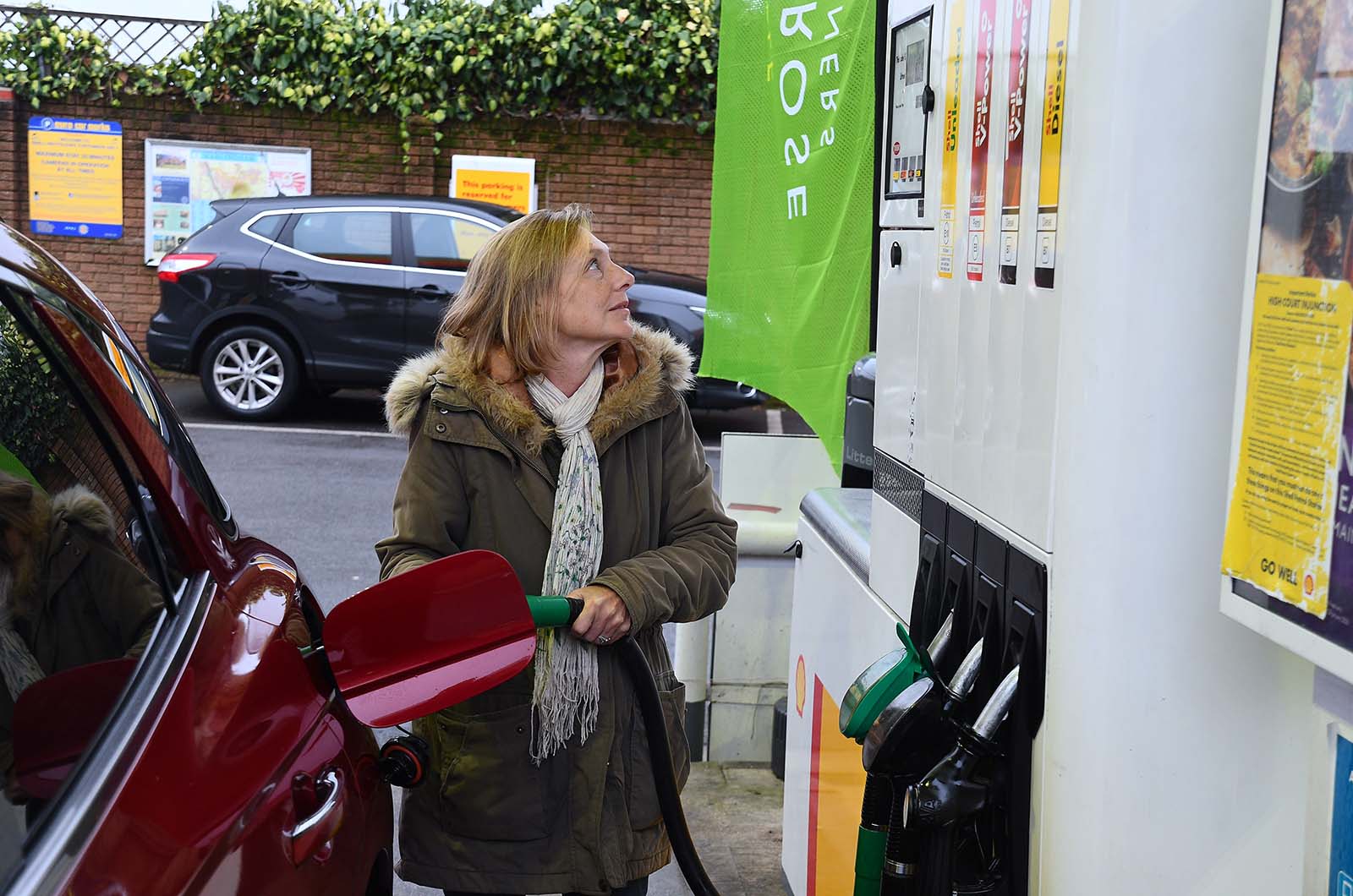 Genesis GV70 at petrol station 