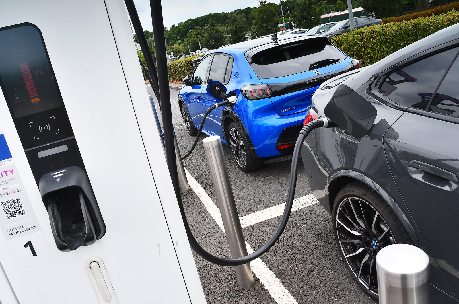 Peugeot e-208 and BMW i4 charging