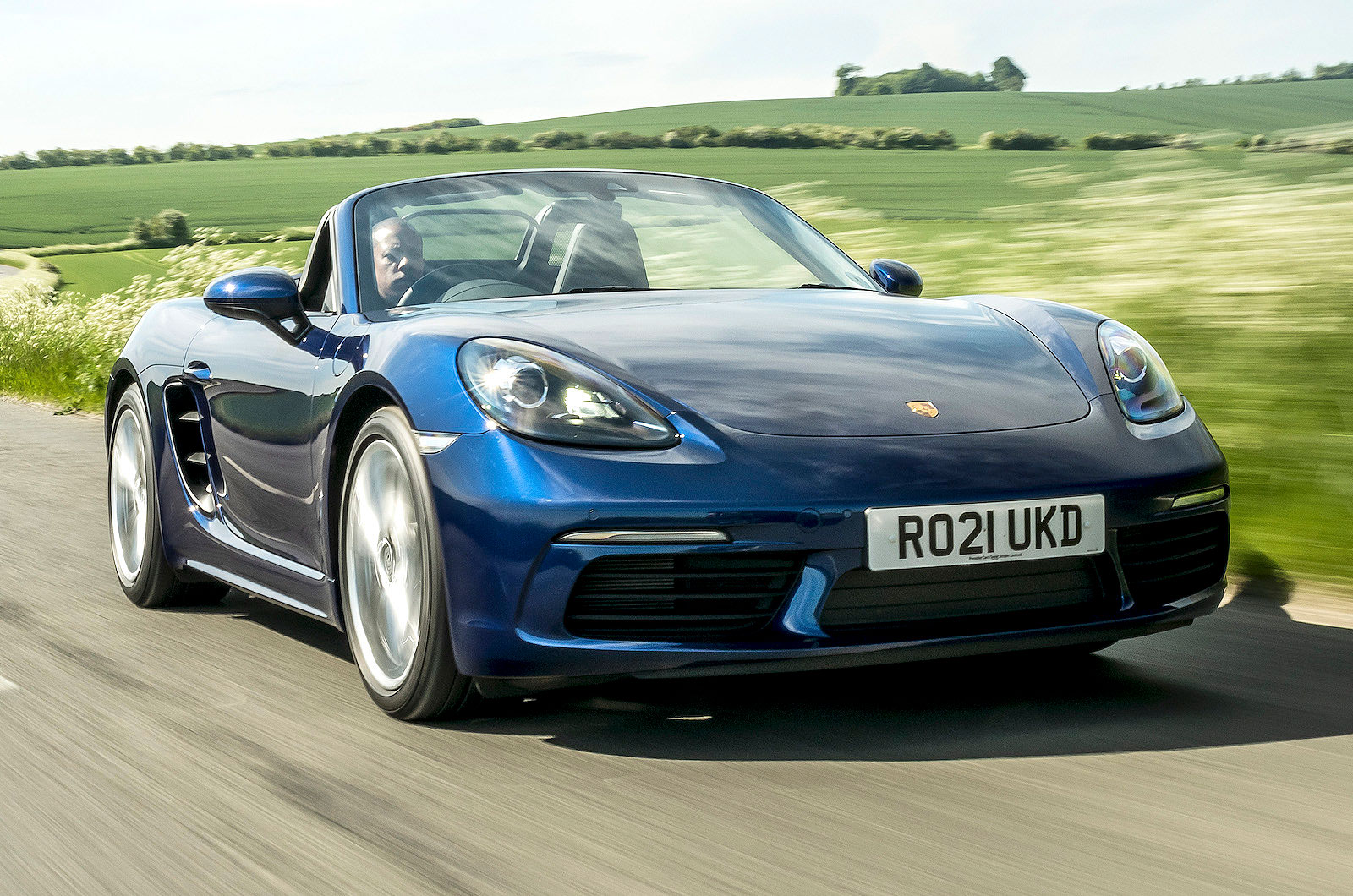 Porsche 718 Boxster front right driving