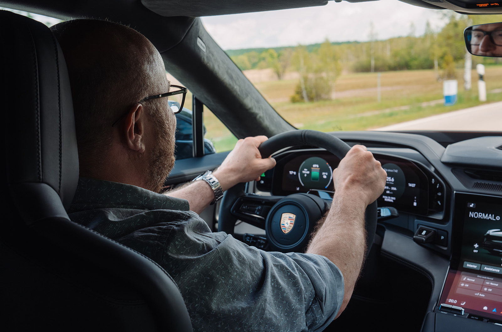 Stuart Milne driving the Porsche Cayenne Coupé Electric