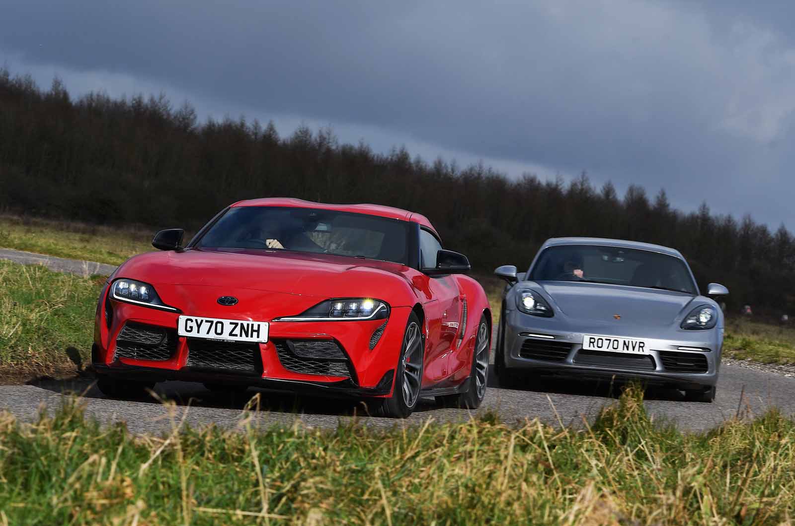 Porsche 718 Cayman vs Toyota GR Supra fronts