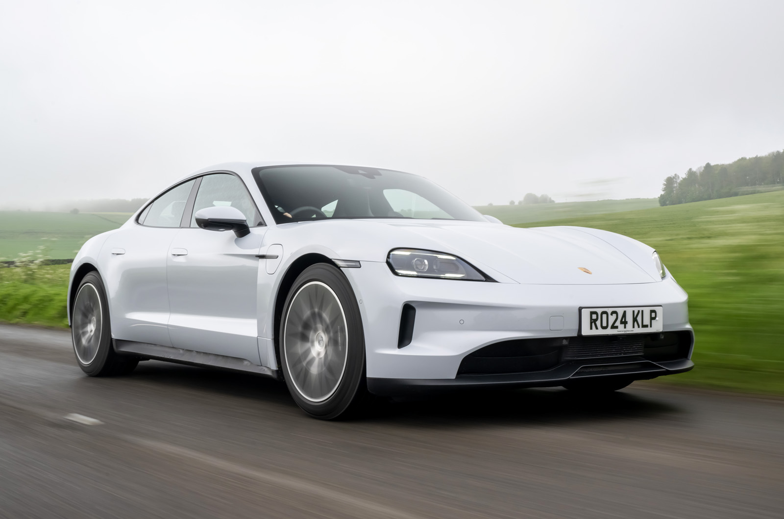 Porsche Taycan front driving silver