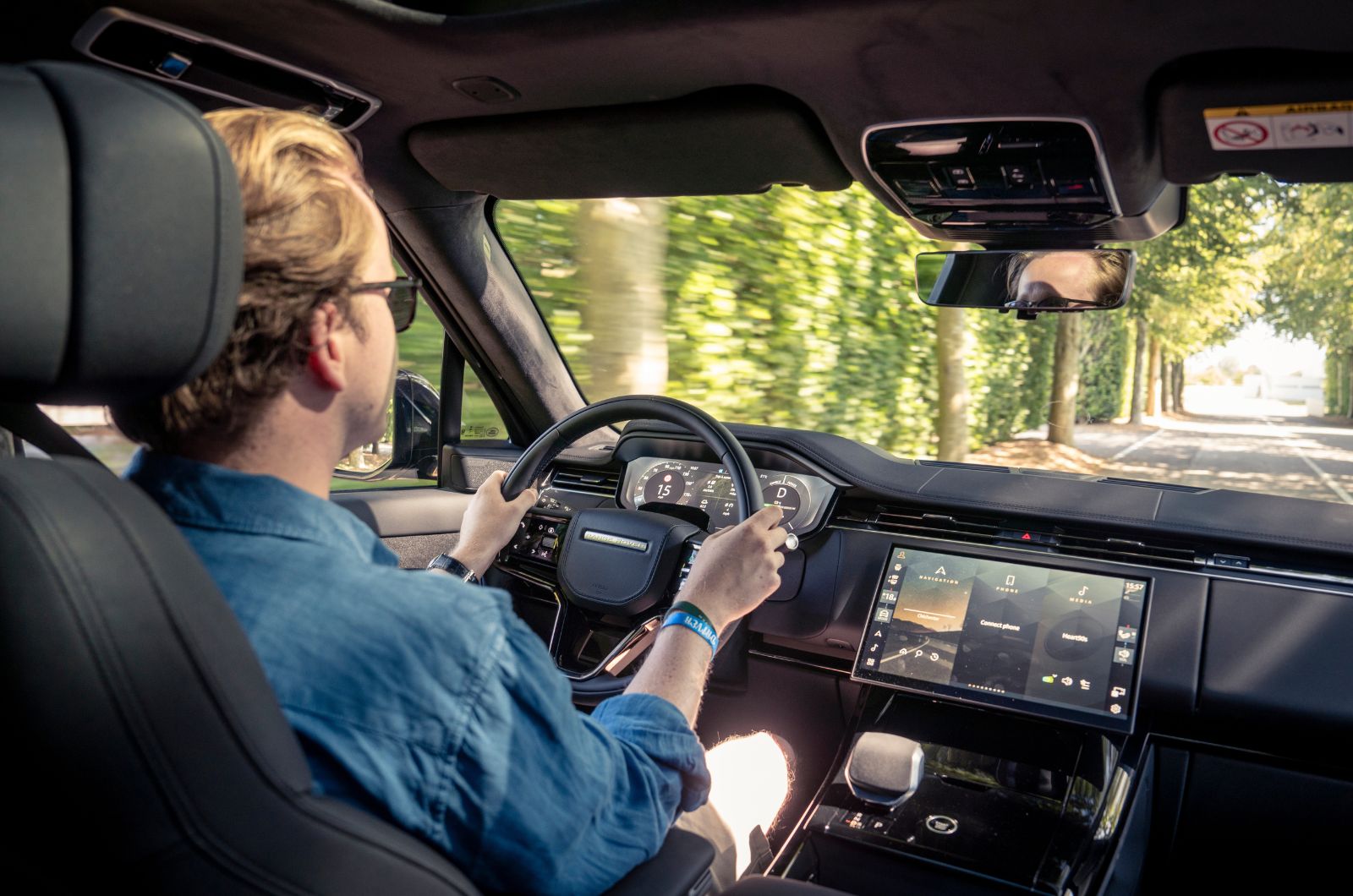 Range Rover Sport Electric interior driving Oliver Young
