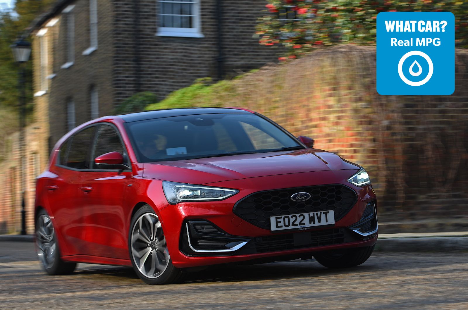 Red Ford Focus cornering with Real MPG logo