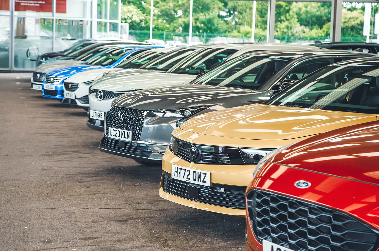 Row of cars at a car dealership