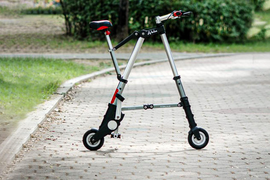 Sinclair A-bike standing upright on path