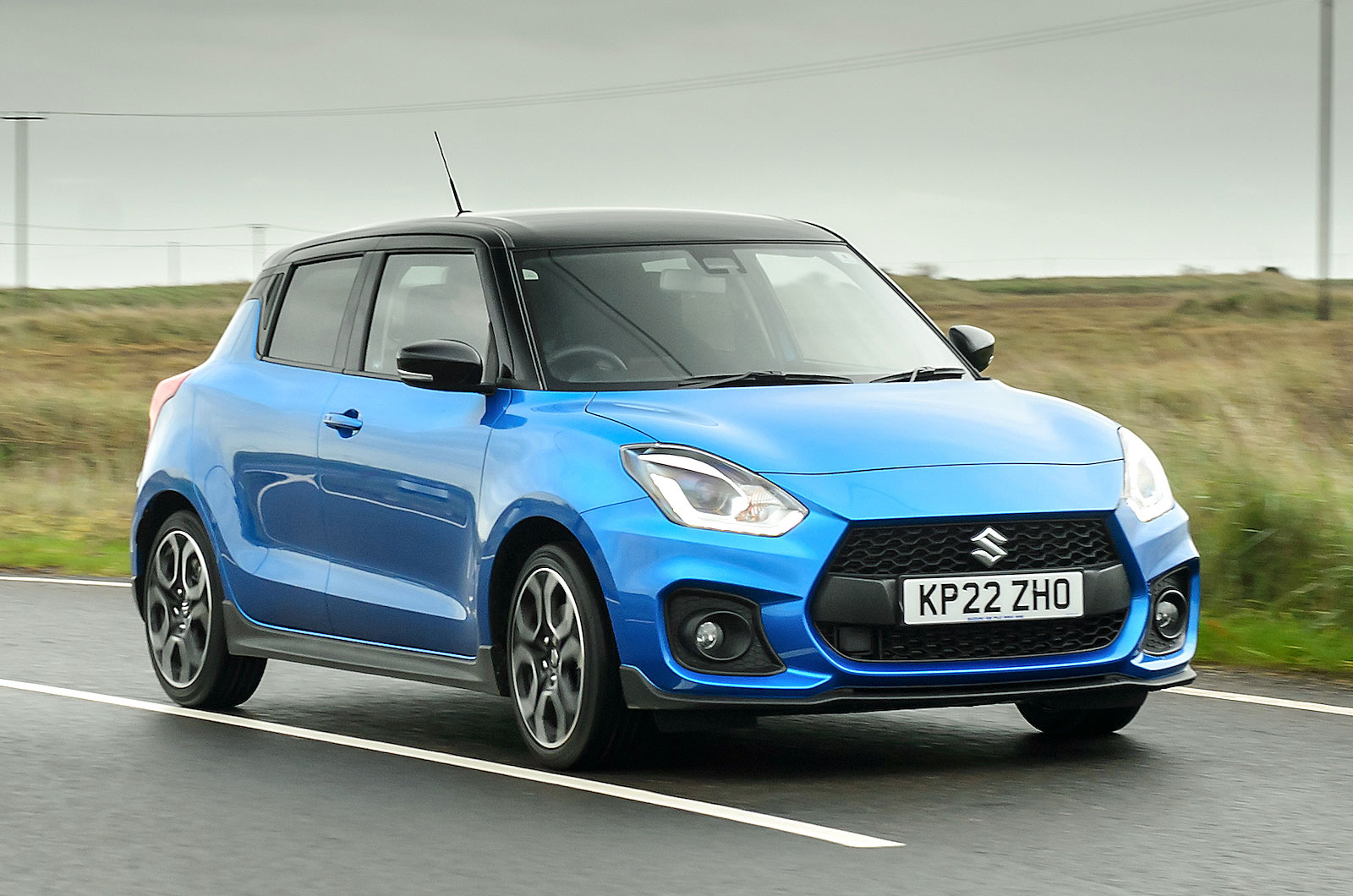 Blue Suzuki Swift Sport front cornering