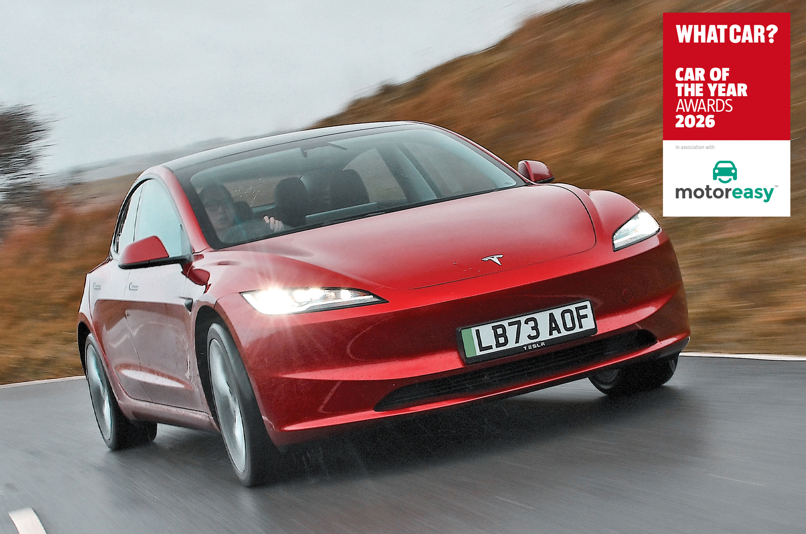 Tesla Model 3 with Car of the Year Awards 2026 logo