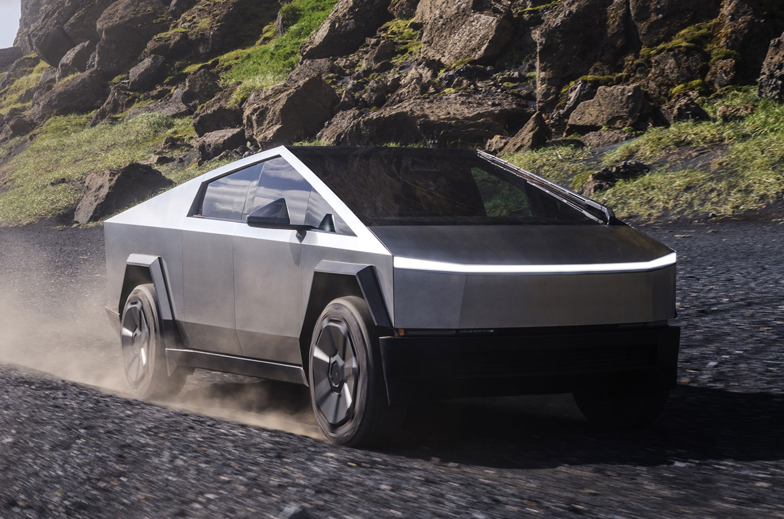 Tesla Cybertruck driving off-road front