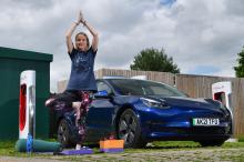 tesla-model-3-long-termer-blue-2021-claire-yoga-pose_1