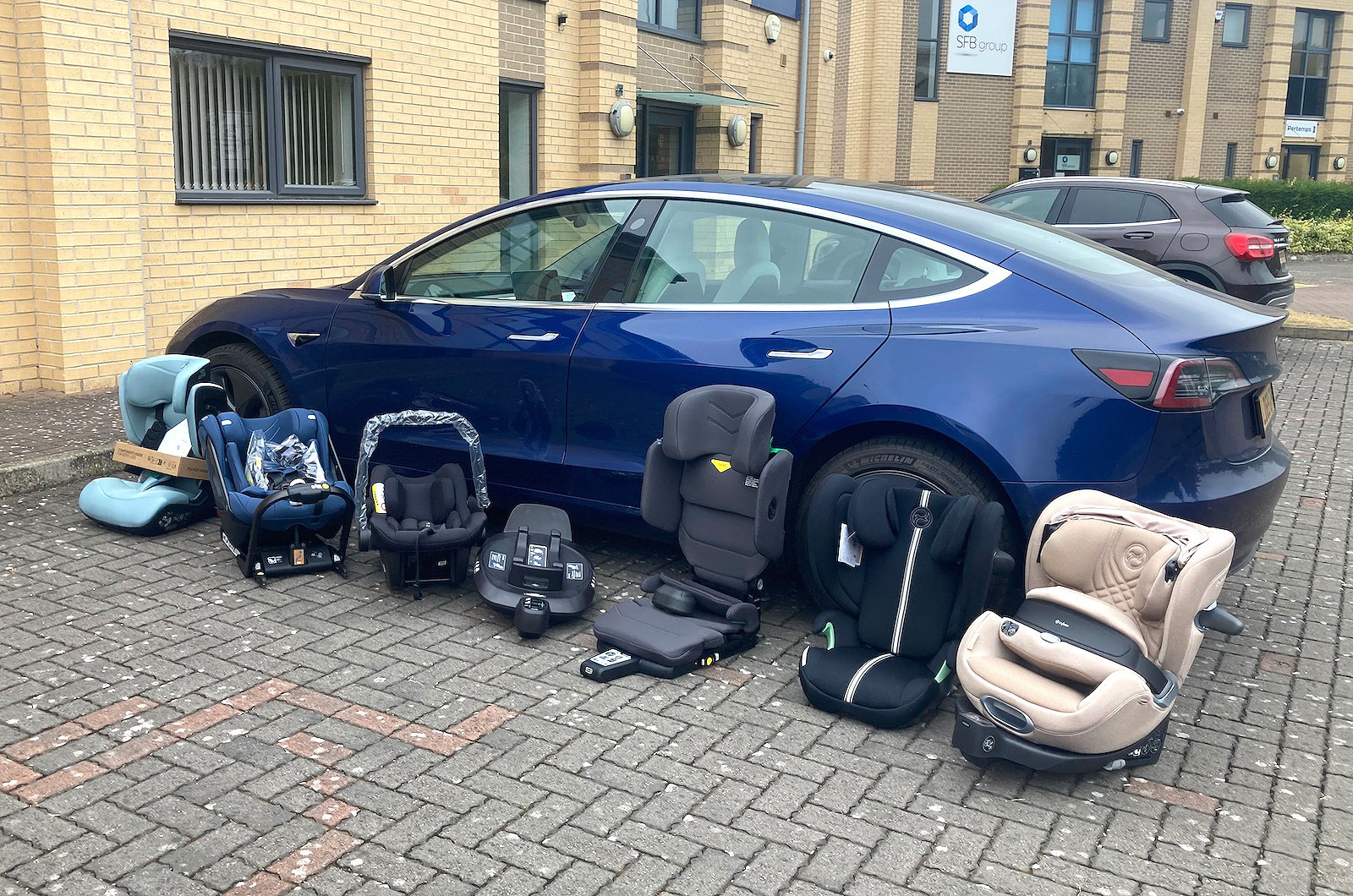 Tesla Model 3 with six child seats